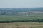 40: The building on the right is in fact in Walberswick, as are the dunes and beach in the centre of the photo. The shadowy vague outline of the Sizewell Power Station lurking further along the coast can just be seen to the left on the far side of the bay.