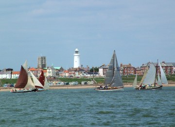 Fishing Smacks Racing Up The Coast